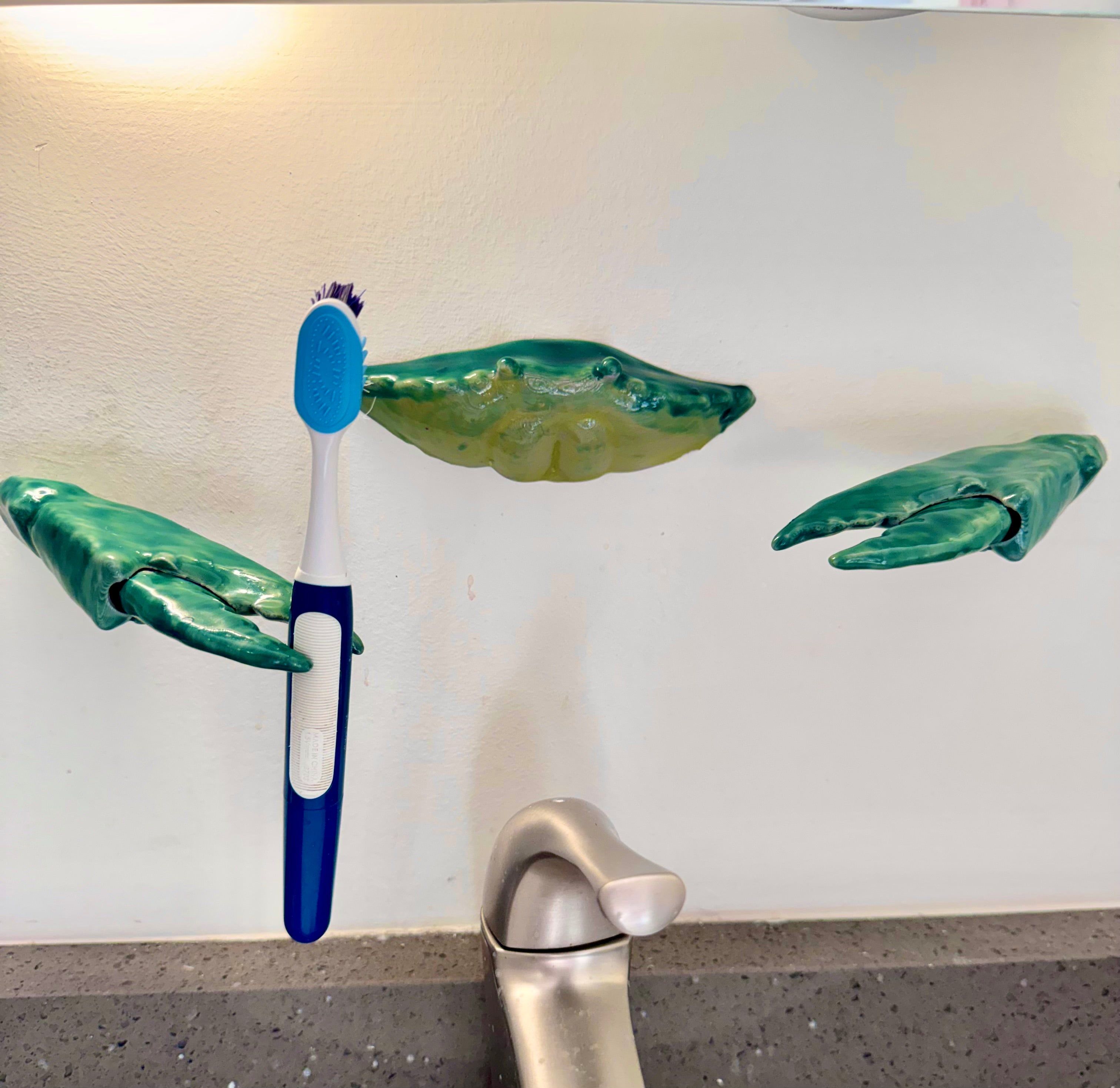 Green crab toothbrush holder