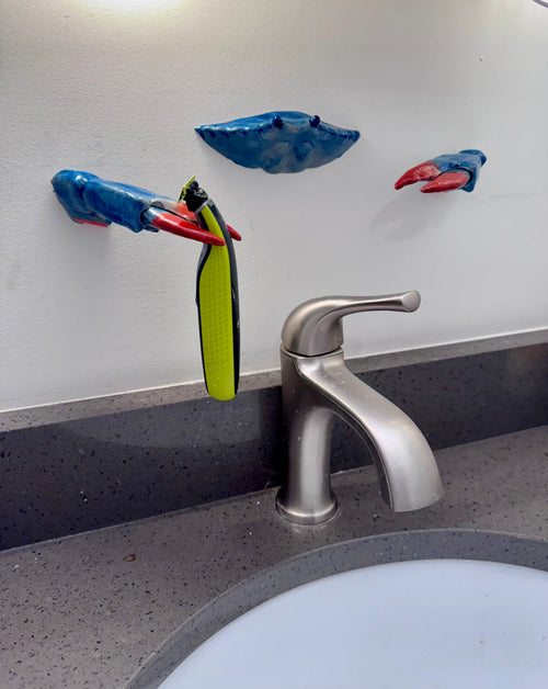 Blue crab toothbrush holder
